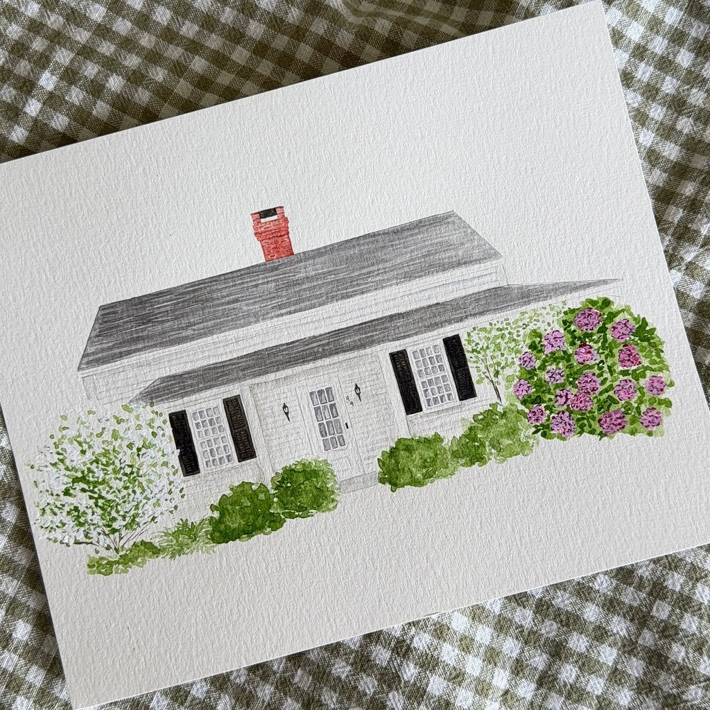 Illustration of a house with flowers on a checkered fabric background