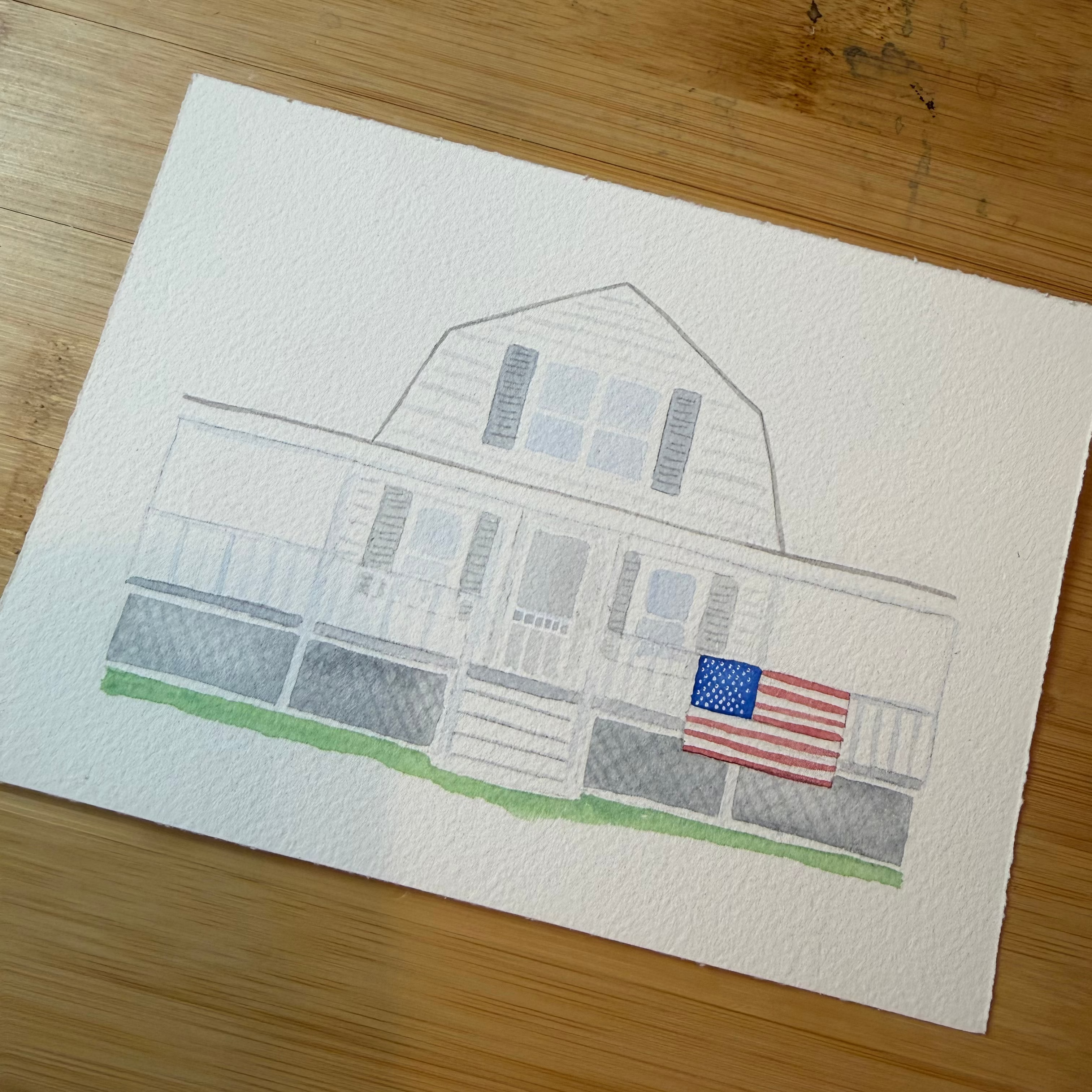 Painting of a house with an American flag on a wooden surface.